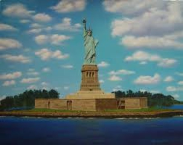 The Statue of Liberty is made visible, with the words,  "The Huddled Masses Yearning To Be Free", she welcomes a large amount of immigrates to America.
