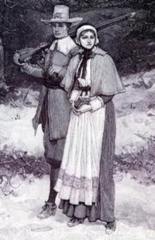 Pilgrims land at Plymouth Rock