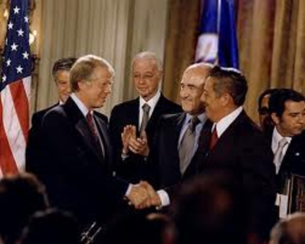 Canal Zone Treaty-U.S. signs treaty to return Canal Zone and control of Panama Canal to Panama by 1999