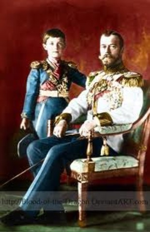Nicholas II abdicates and includes son