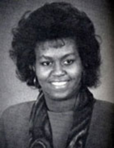 Michelle graduates from Harvard University.