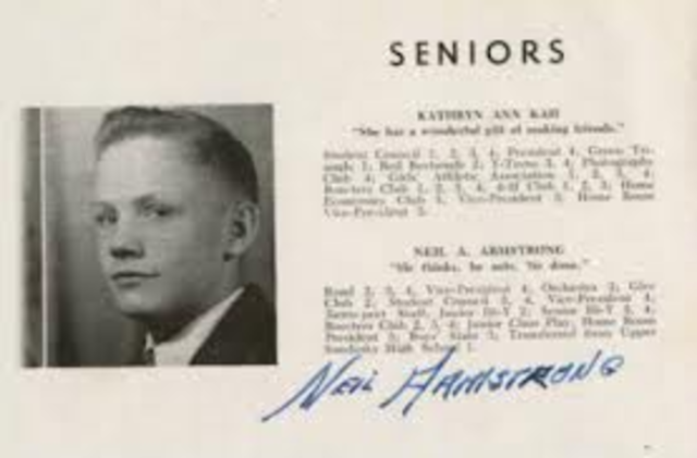 Neil graduates from highschool.