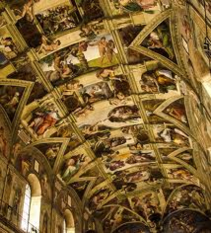 Michelangelo paints the ceiling of the Sistine Chapel