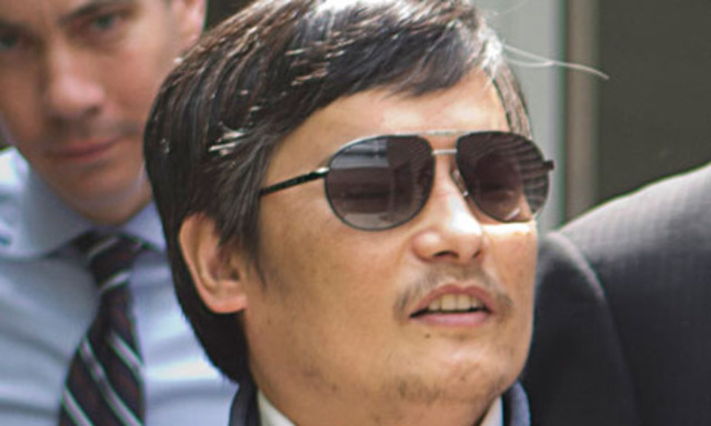 Chen Guangchearrives in US but fears remain for family in China