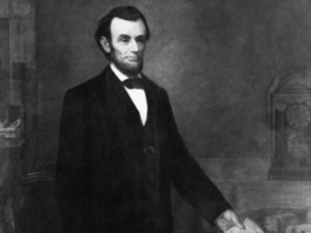 President Lincoln signs a federal draft act