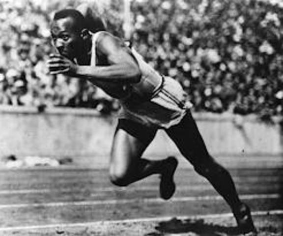 Jessie Owens wins four gold medals at berlin Olympics