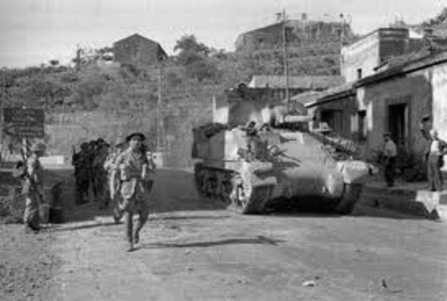 US and British troops land on Sicily. By mid-August, the Allies control Sicily.