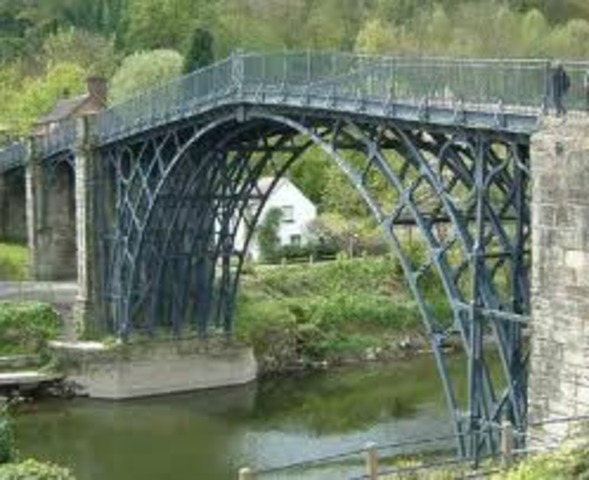 The first cast iron bridge is built in England