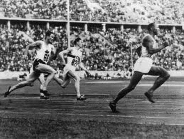 Jessie Owens Wins Four Gold Metals at Berlin Olympics