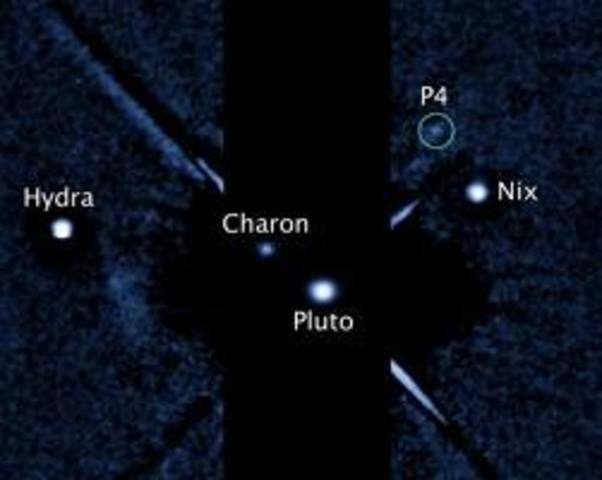 Discovery of S/2011 (134340) 1