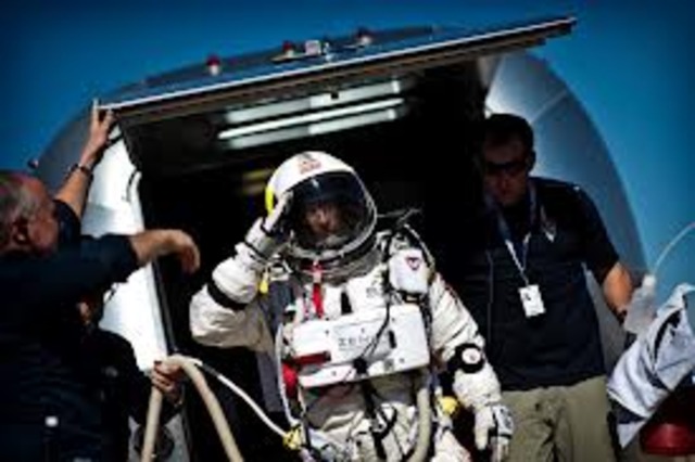 Baumgartner breaks a sky-dive record and lands on Earth safely