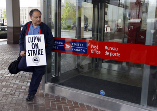 Postal workers go on strike