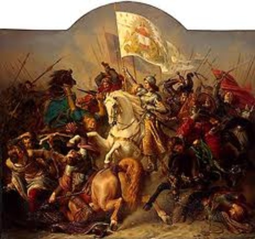Joan of Arc leads French troops against the English at Orleans