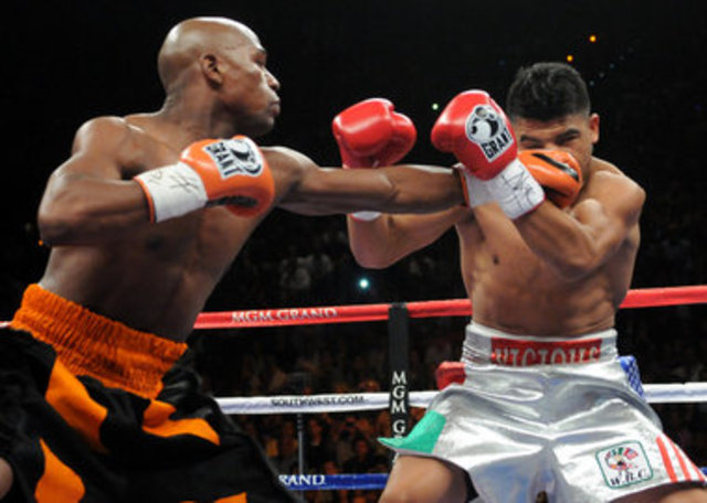Wins first pay-per-view main event in blowout of Arturo Gatti.