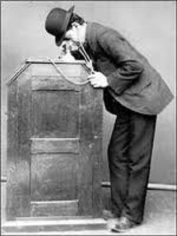 Thomas Edison demonstrates the first "talking movie"