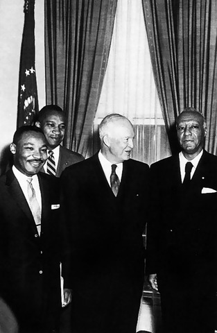 Dr. King attends the signing of the Civil Rights Act of 1964