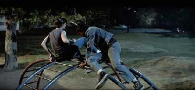 Darry slaps Pony and Pony runs away with Johnny