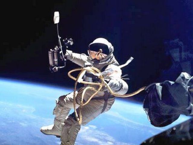Alexei Leonov spends 12 minutes outside of his space craft performing the first space walk