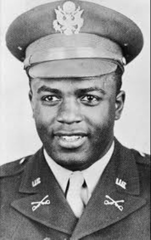 Jackie Robinson enrolls in the Army