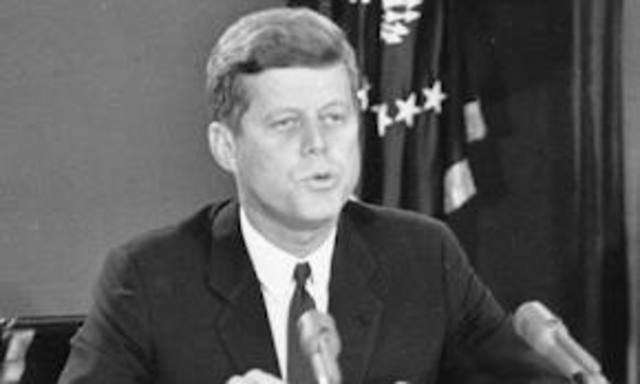 U.S. President John F. Kennedy announces to the nation the existence of Soviet missiles in Cuba