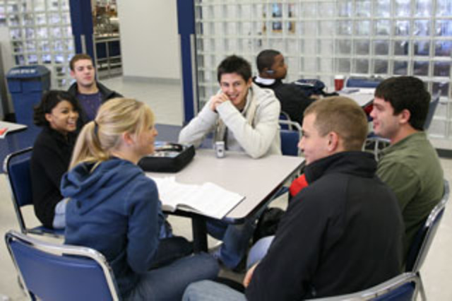 I hang with my friends in the cafeteria before school starts.