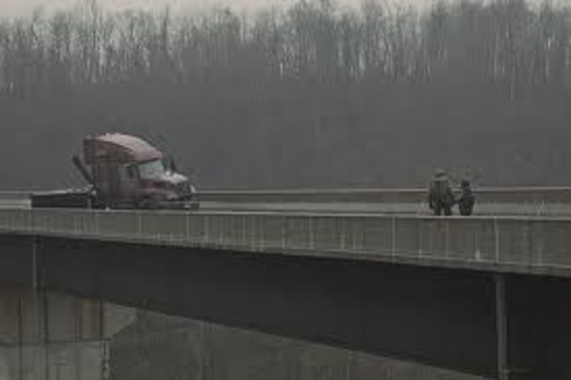 The truck blocking the bridge