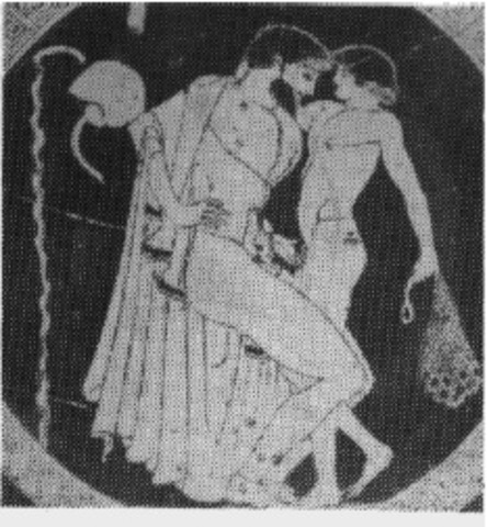 Hombre griego jugando con pene de niño