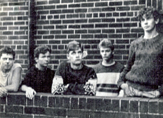 Rick begins playing Drums in a local band