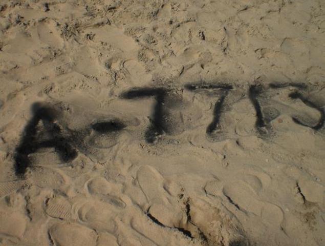 Elie is tattooed A-7713 on his left arm