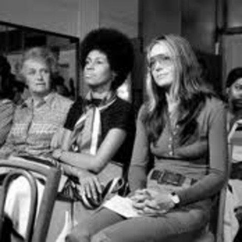 Gloria Host a crowd of female journalists