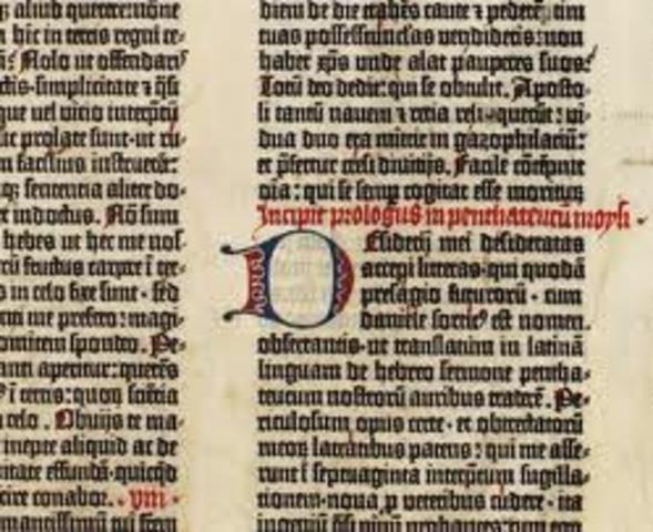 Gutenberg prints Bible using movable type