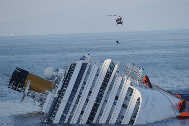 Cruise ship, Costa Concordia, runs aground at Isola de Giglio, Italy, with at least 15 deaths