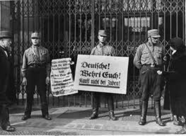 A nationwide boycott of Jewish-owned businesses in Germany is carried out under Nazi leadership.