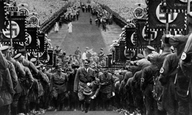 Adolf Hitler declares himself president and chancellor of the Third Reich after the death of Paul von Hindenburg.