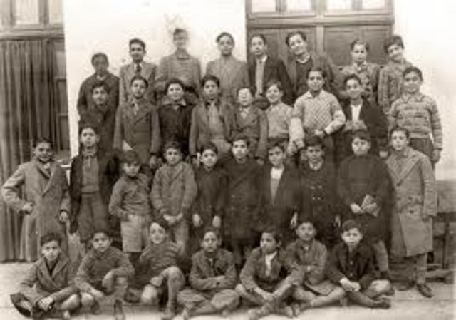 The law against "overcrowding in German schools and universities" is adopted, restricting the number of Jewish children allowed to attend. Children of war veterans and those with one non-Jewish parent are initially exempted.