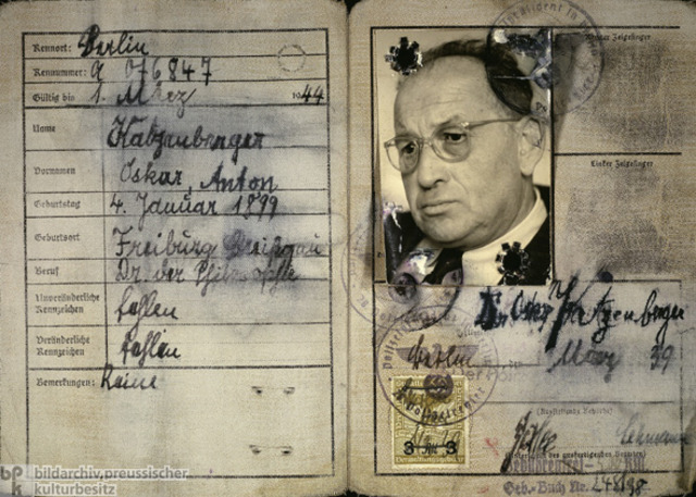 The German government announces Jews must carry identification cards.