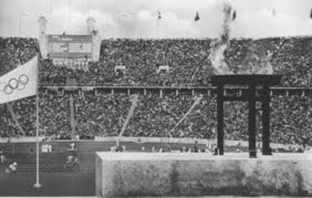 The Olympic Games take place in Berlin. Anti-Jewish signs (i.e., "Jews Not Welcome") are removed until the Games are completed.