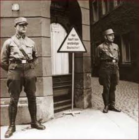 A nationwide boycott of Jewish-owned businesses in Germany is carried out under Nazi leadership.