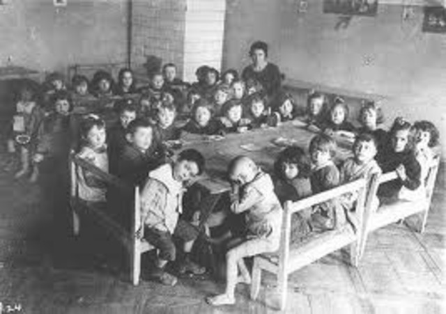 The law against "overcrowding in German schools and universities" is adopted, restricting the number of Jewish children allowed to attend. Children of war veterans and those with one non-Jewish parent are initially exempted.