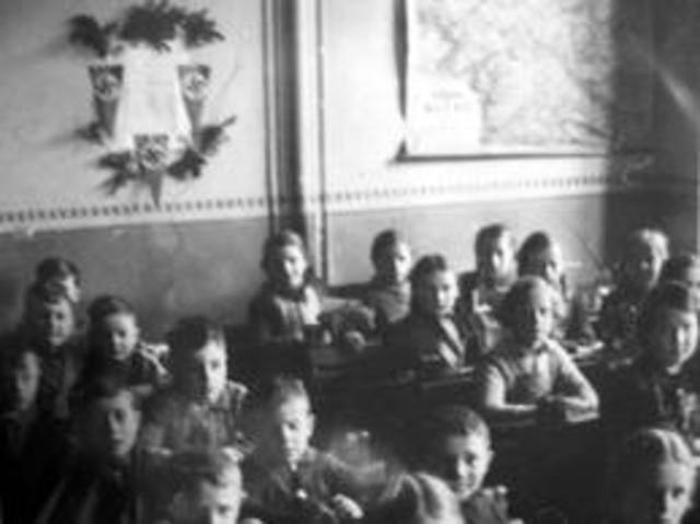 The law against "overcrowding in German schools and universities" is adopted, restricting the number of Jewish children allowed to attend. Children of war veterans and those with one non-Jewish parent are initially exempted.