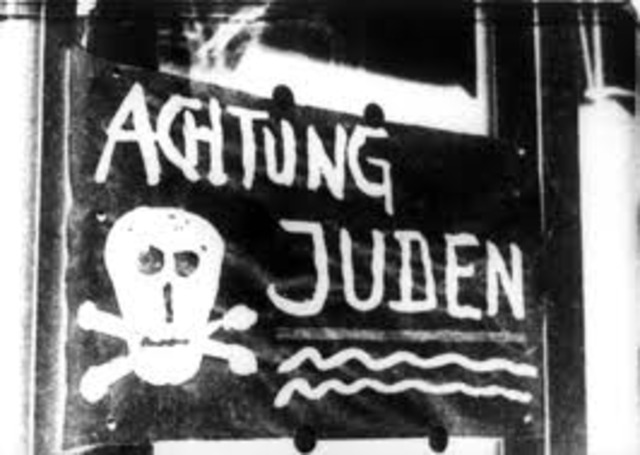 "No Jews" signs and notices are posted outside German towns and villages, and outside shops and restaurants.