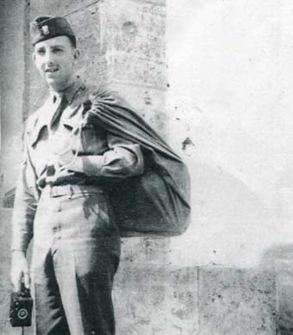 Hitler violates the Versailles Treaty by renewing the compulsory military draft.