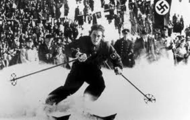 The Olympic Games take place in Berlin. Anti-Jewish signs (i.e., "Jews Not Welcome") are removed until the Games are completed.