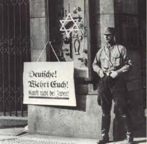 A nationwide boycott of Jewish-owned businesses in Germany is carried out under Nazi leadership