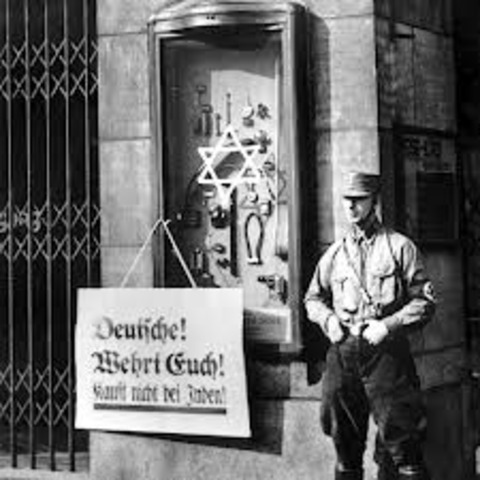 A nationwide boycott of Jewish-owned businesses in Germany is carried out under Nazi leadership.