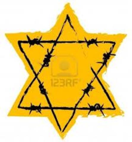 A nationwide boycott of Jewish-owned businesses in Germany is carried out under Nazi leadership.