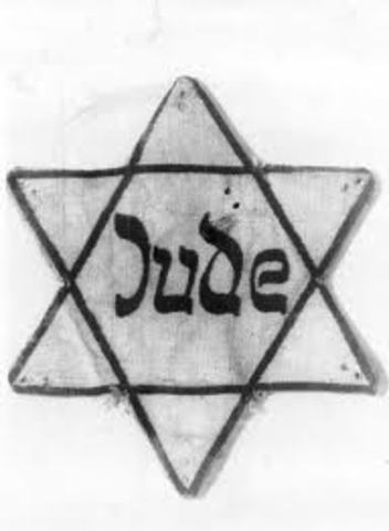 Decrees ban Jews from public streets on certain days; Jews are forbidden drivers' licenses and car registrations.