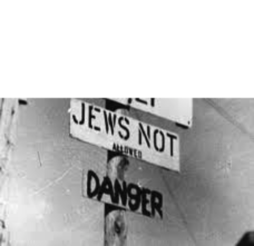 "No Jews" signs and notices are posted outside German towns and villages, and outside shops and restaurants.