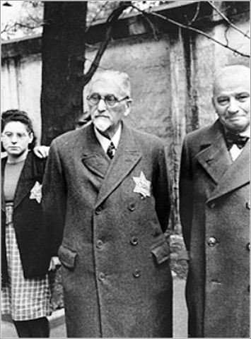 The German government announces Jews must carry identification cards.