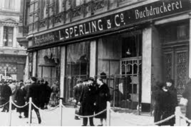 Jews must sell their businesses and real estate and hand over their securities and jewelry to the government at artificially low prices.